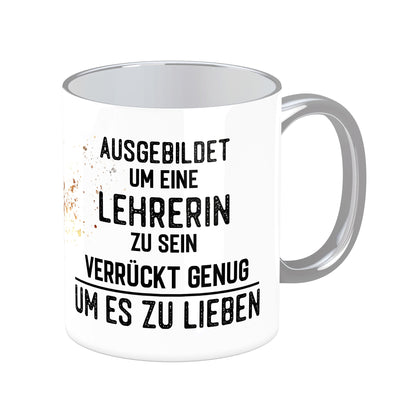 Tasse mit Spruch: Ausgebildet um eine Lehrerin zu sein ...